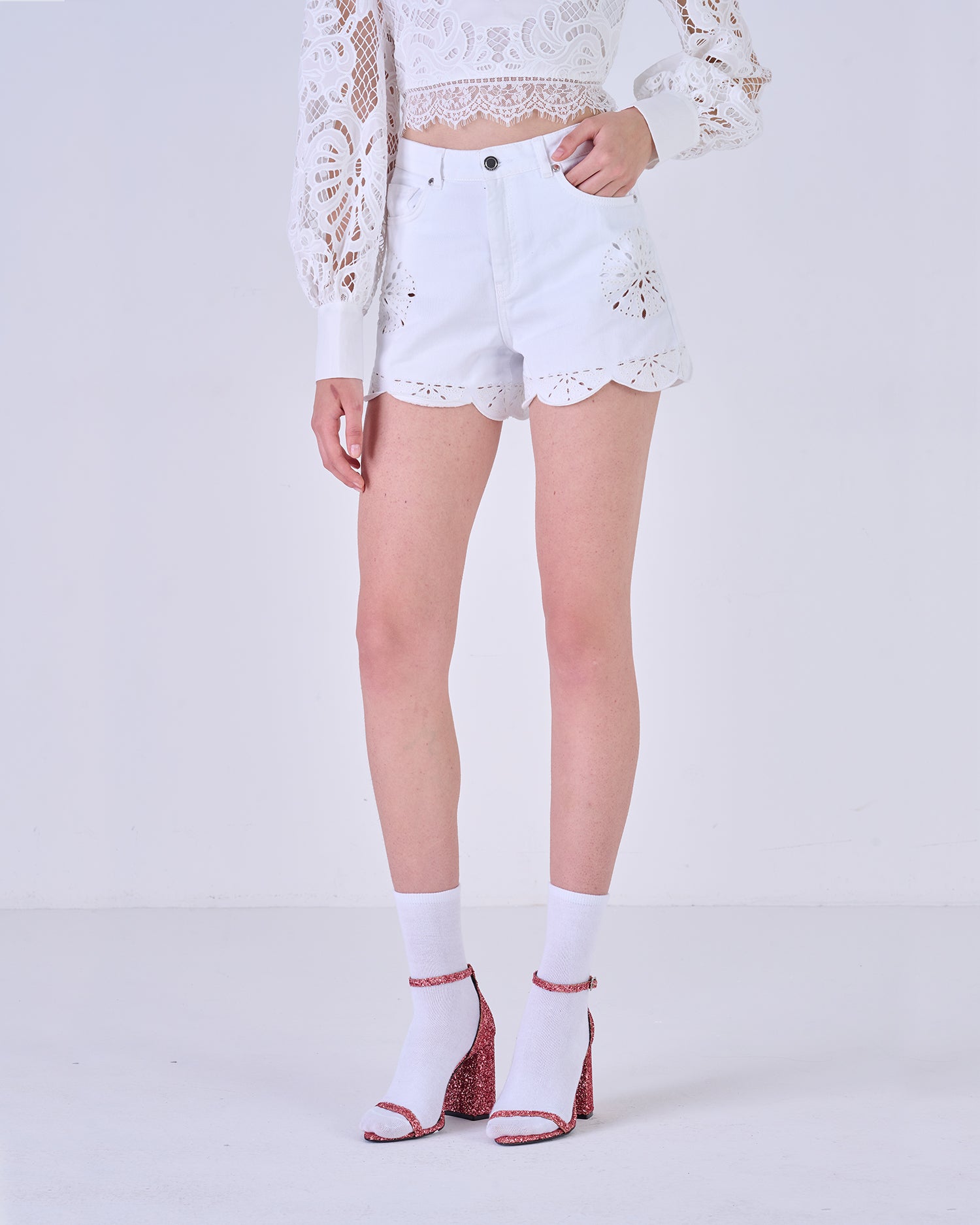 Shorts with openwork embroidery